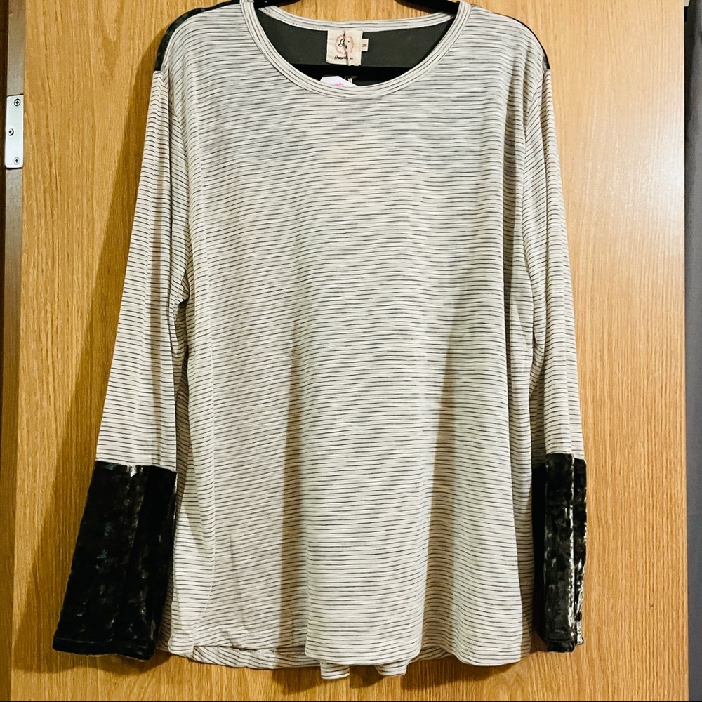 Cream top with light pinstripe